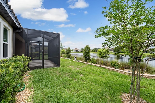 33219 Kateland Dr, Wesley Chapel, FL 33545 - view of yard featuring a water view and a lanai