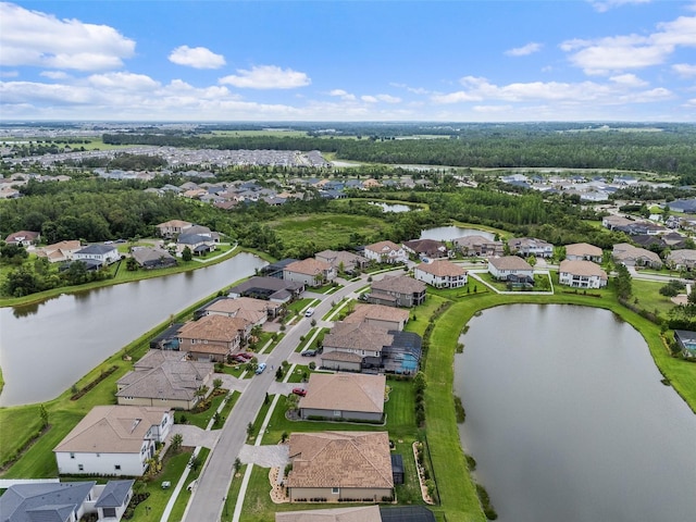33219 Kateland Dr, Wesley Chapel, FL 33545 - aerial perspective of suburban area featuring a nearby body of water