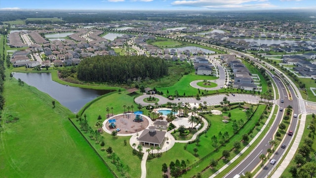 33219 Kateland Dr, Wesley Chapel, FL 33545 - aerial overview of property's location featuring a nearby body of water and nearby suburban area
