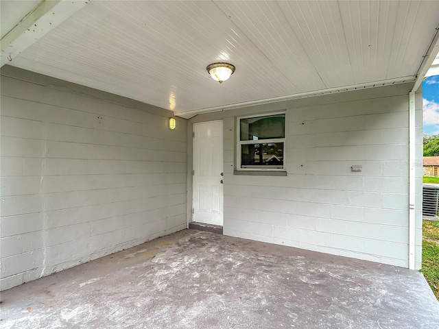 8329 Gulf Way, Hudson, FL 34667 - view of patio / terrace with a carport