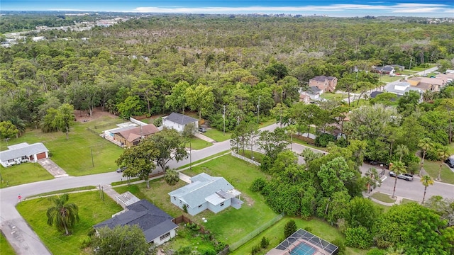 8329 Gulf Way, Hudson, FL 34667 - aerial view of property and surrounding area with a heavily wooded area and nearby suburban area
