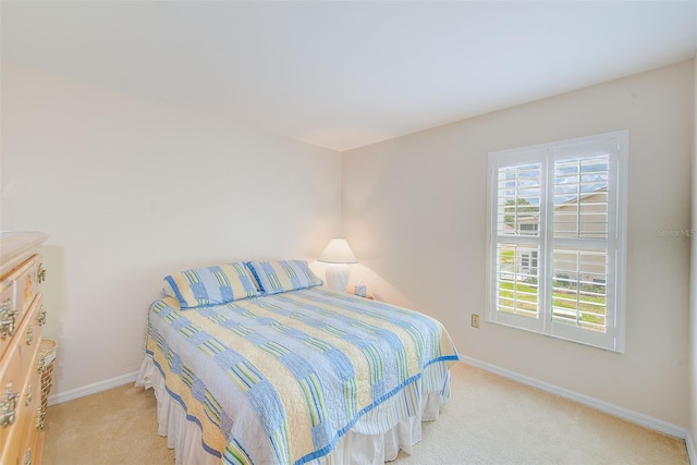 7823 Hardwick Dr Unit 224, New Port Richey, FL 34653 - carpeted bedroom with baseboards