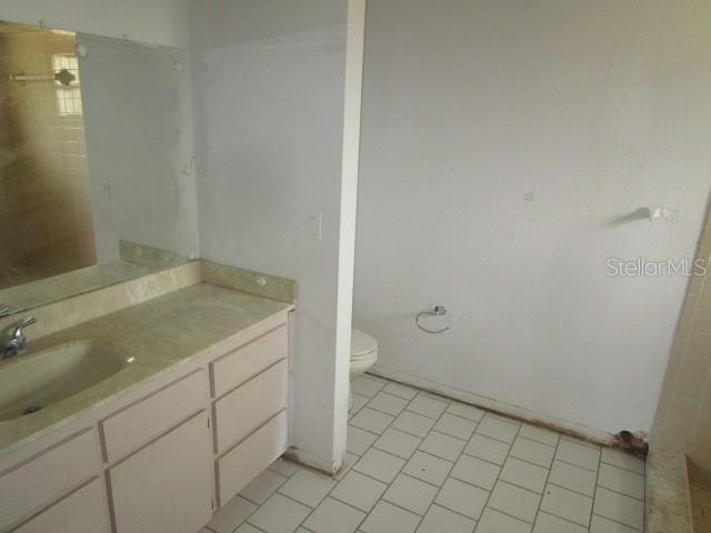 5190 Starling Dr, Mulberry, FL 33860 - full bath with vanity, tile patterned flooring, and a shower