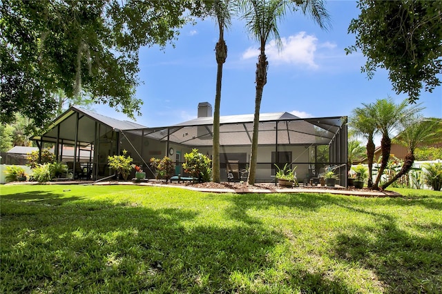 12219 Steppingstone Blvd, Tampa, FL 33635 - back of property featuring a yard, a lanai, and a chimney
