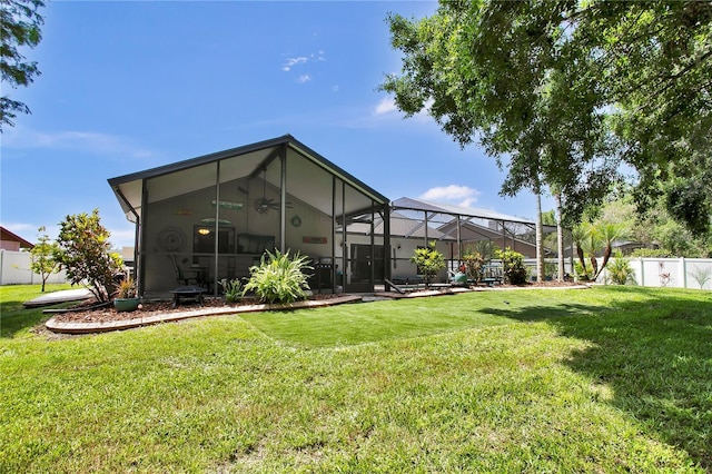 12219 Steppingstone Blvd, Tampa, FL 33635 - back of property with a ceiling fan and glass enclosure
