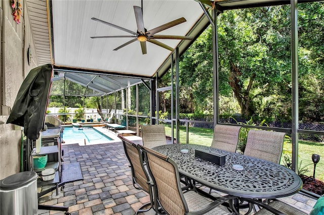 12219 Steppingstone Blvd, Tampa, FL 33635 - view of patio / terrace featuring outdoor dining space, a ceiling fan, and a lanai