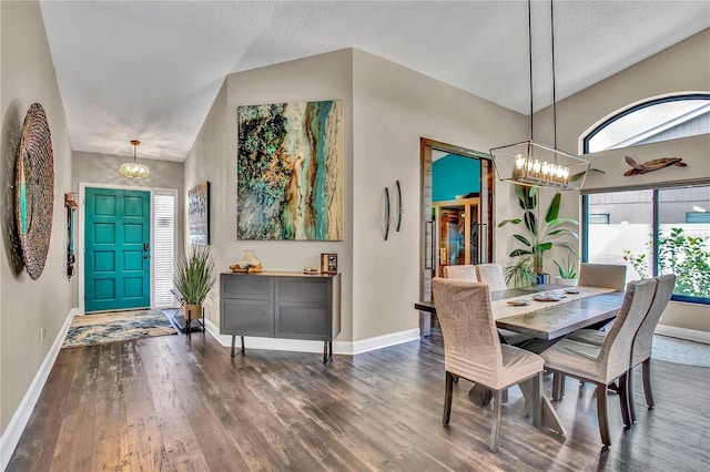 12219 Steppingstone Blvd, Tampa, FL 33635 - dining area featuring a chandelier, plenty of natural light, baseboards, wood finished floors, and a textured ceiling