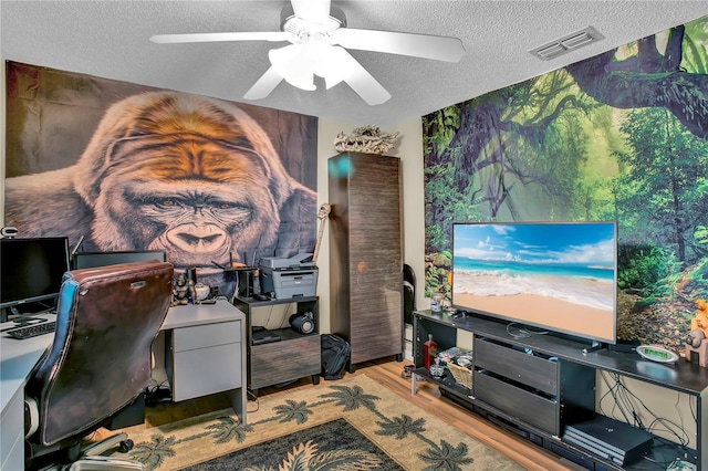 12219 Steppingstone Blvd, Tampa, FL 33635 - office with a textured ceiling, wood finished floors, and ceiling fan