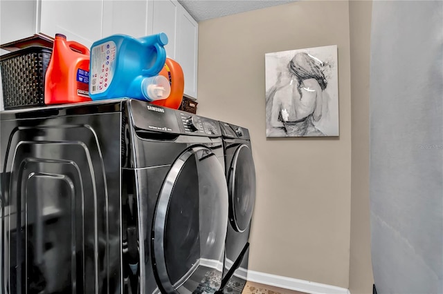12219 Steppingstone Blvd, Tampa, FL 33635 - laundry area with separate washer and dryer and baseboards