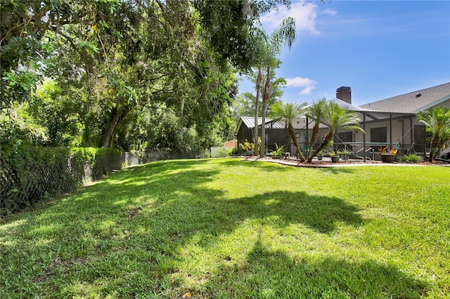 12219 Steppingstone Blvd, Tampa, FL 33635 - view of yard featuring a lanai