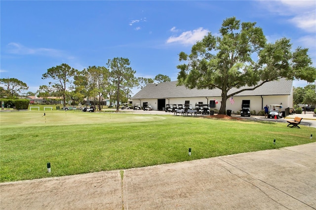 12219 Steppingstone Blvd, Tampa, FL 33635 - view of property's community featuring a lawn and a putting green