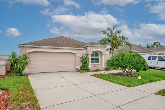 241 Royal Palm Way, Spring Hill, FL 34608 - mediterranean / spanish house with stucco siding, an attached garage, and concrete driveway