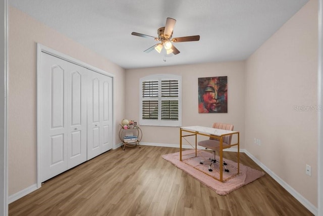 241 Royal Palm Way, Spring Hill, FL 34608 - office area with wood finished floors, baseboards, and ceiling fan