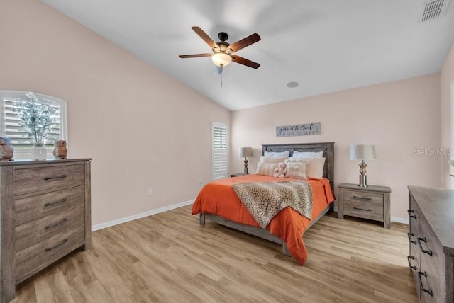 241 Royal Palm Way, Spring Hill, FL 34608 - bedroom with vaulted ceiling, light wood-type flooring, baseboards, and a ceiling fan