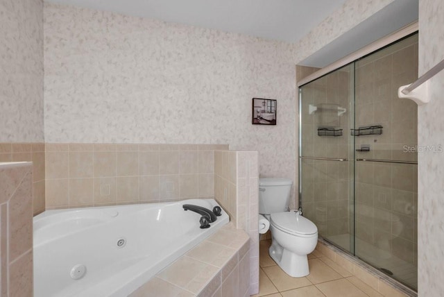 241 Royal Palm Way, Spring Hill, FL 34608 - bathroom with wallpapered walls, a tub with jets, toilet, a stall shower, and tile patterned floors