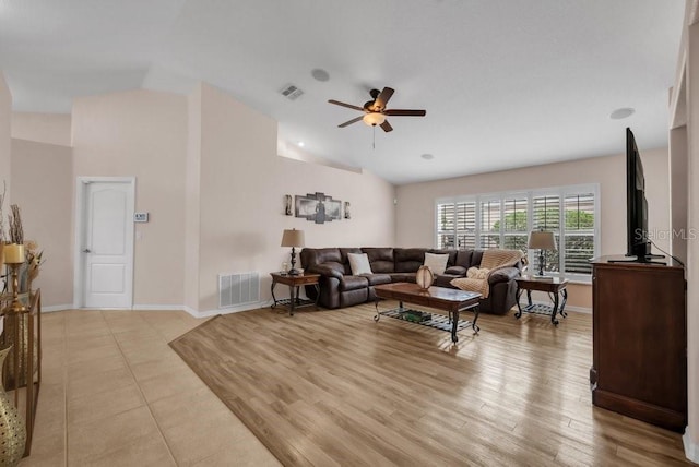 241 Royal Palm Way, Spring Hill, FL 34608 - living area featuring a ceiling fan, baseboards, lofted ceiling, and light wood finished floors