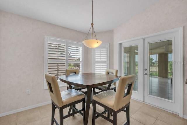 241 Royal Palm Way, Spring Hill, FL 34608 - dining room with french doors, light tile patterned flooring, and baseboards