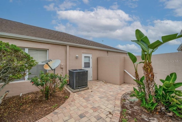 241 Royal Palm Way, Spring Hill, FL 34608 - view of patio / terrace with central AC