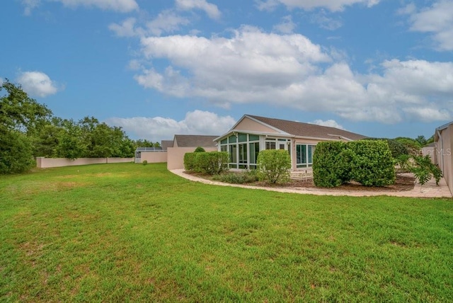 241 Royal Palm Way, Spring Hill, FL 34608 - rear view of property with a sunroom