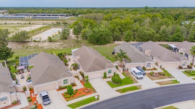 241 Royal Palm Way, Spring Hill, FL 34608 - aerial view of residential area featuring a heavily wooded area