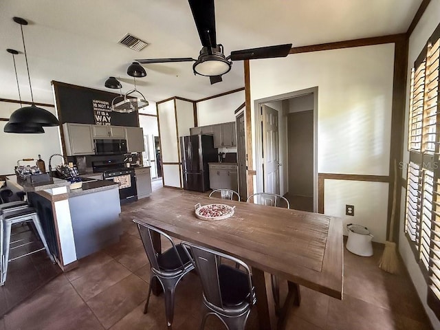 1716 Bondurant Way, Brandon, FL 33511 - dining space featuring dark tile patterned floors and ceiling fan