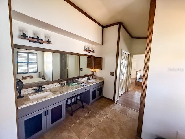 1716 Bondurant Way, Brandon, FL 33511 - bathroom featuring double vanity, crown molding, tile patterned flooring, and a bath
