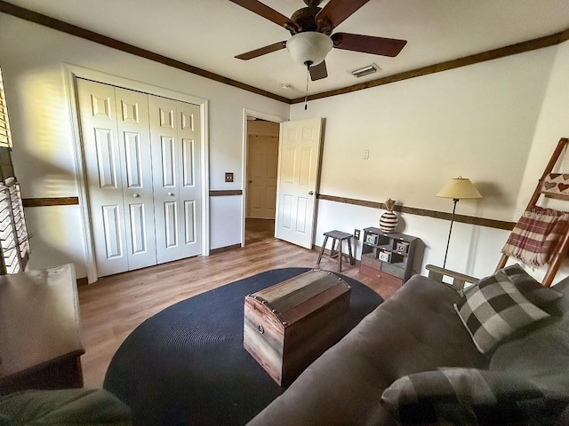 1716 Bondurant Way, Brandon, FL 33511 - living area featuring a ceiling fan, wood finished floors, and ornamental molding