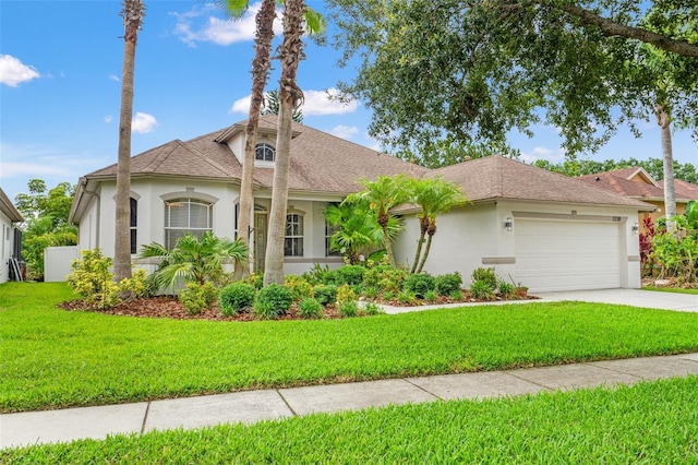 2238 Shirecrest Cove Way, Lutz, FL 33558 - view of front of property with stucco siding, a garage, concrete driveway, and a front lawn