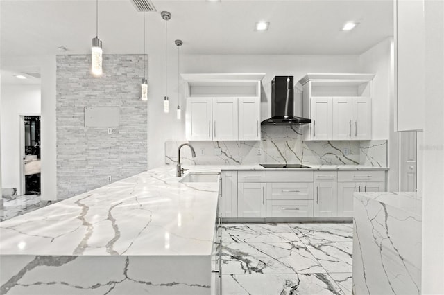 2238 Shirecrest Cove Way, Lutz, FL 33558 - kitchen featuring wall chimney exhaust hood, a sink, black electric cooktop, decorative backsplash, and white cabinets