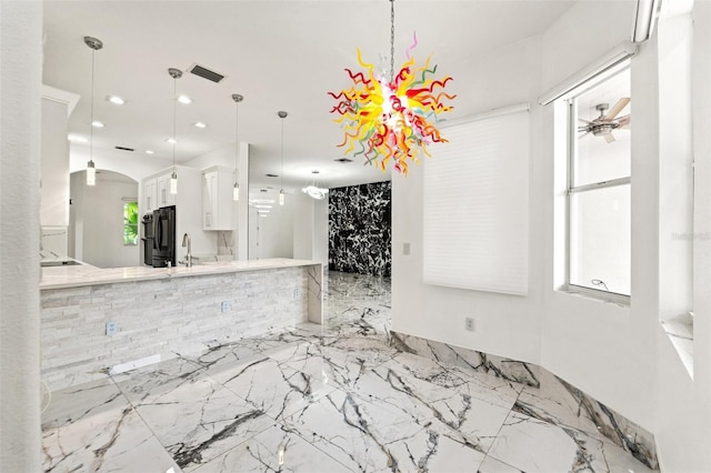 2238 Shirecrest Cove Way, Lutz, FL 33558 - unfurnished living room featuring recessed lighting, marble tiled flooring, ceiling fan, arched walkways, and healthy amount of natural light
