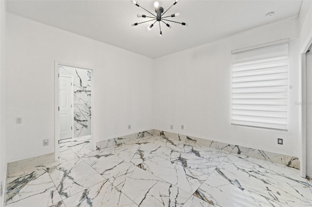 2238 Shirecrest Cove Way, Lutz, FL 33558 - unfurnished room featuring a chandelier and light marble finish floors