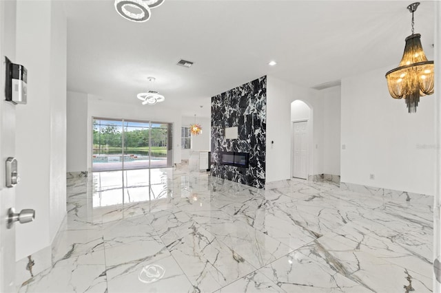 2238 Shirecrest Cove Way, Lutz, FL 33558 - living room featuring marble tiled flooring and arched walkways