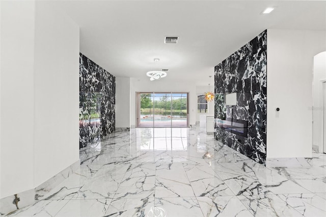 2238 Shirecrest Cove Way, Lutz, FL 33558 - unfurnished living room featuring marble tiled floors