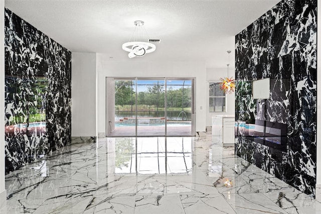 2238 Shirecrest Cove Way, Lutz, FL 33558 - dining room with light marble finish flooring and a chandelier