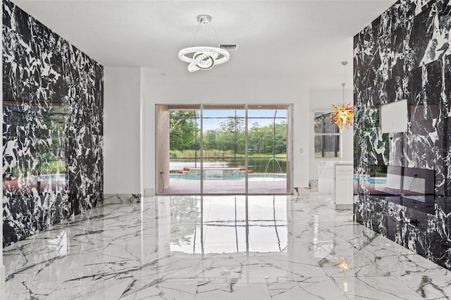 2238 Shirecrest Cove Way, Lutz, FL 33558 - dining space featuring marble tiled flooring and a chandelier