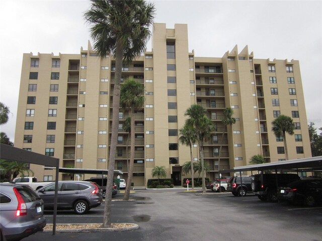 2616 Cove Cay Dr Unit 104, Clearwater, FL 33760 - view of apartment building / complex with covered parking