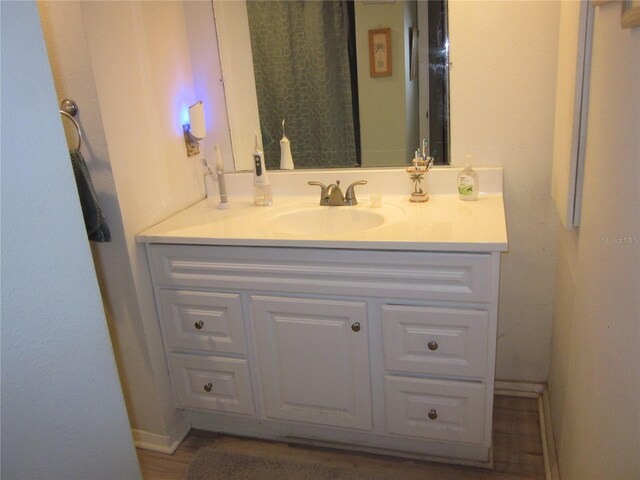2616 Cove Cay Dr Unit 104, Clearwater, FL 33760 - bathroom with vanity and baseboards