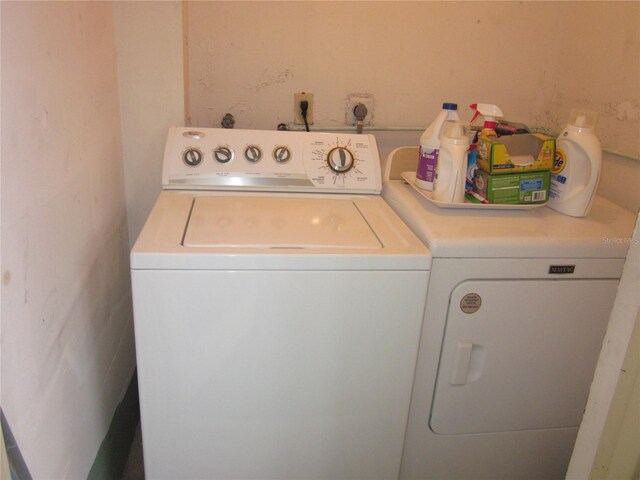 2616 Cove Cay Dr Unit 104, Clearwater, FL 33760 - washroom with washing machine and dryer