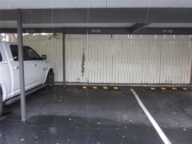 2616 Cove Cay Dr Unit 104, Clearwater, FL 33760 - garage featuring covered parking