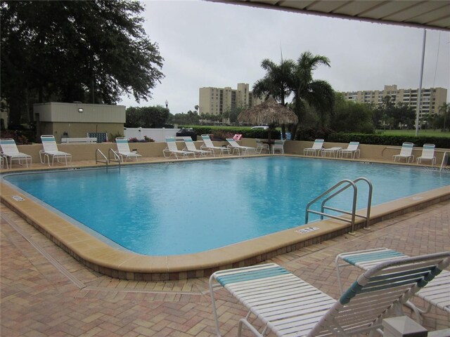 2616 Cove Cay Dr Unit 104, Clearwater, FL 33760 - community pool featuring a patio area