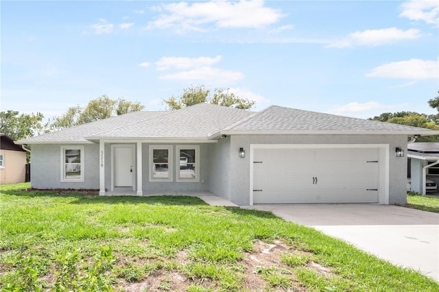 5319 Lantana St, Zephyrhills, FL 33542 - ranch-style house featuring a garage, stucco siding, a front yard, and roof with shingles