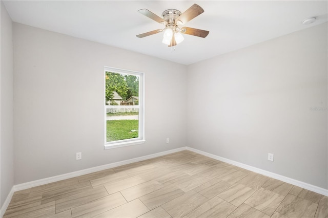 5319 Lantana St, Zephyrhills, FL 33542 - spare room with baseboards, a smoke detector, and ceiling fan