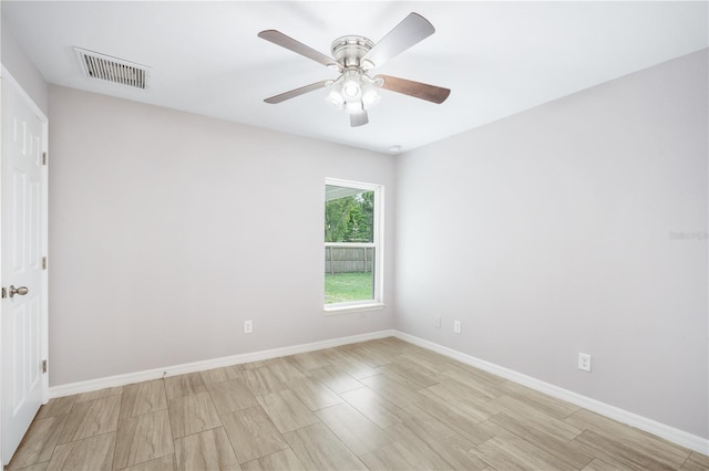 5319 Lantana St, Zephyrhills, FL 33542 - spare room featuring baseboards, ceiling fan, and light wood-style flooring