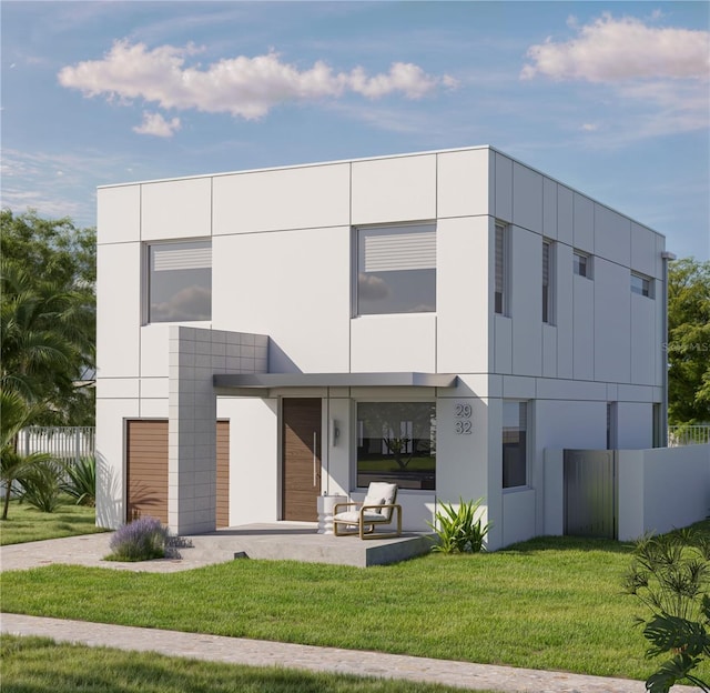 2932 Fairfield Ave S, Saint Petersburg, FL 33712 - view of front facade with driveway, stucco siding, and an attached garage