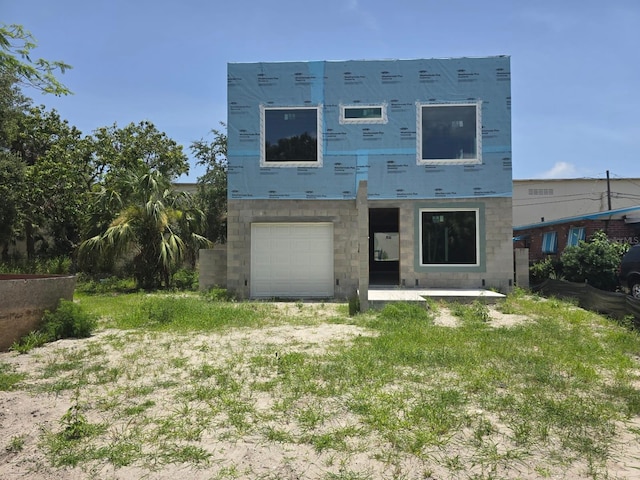 2932 Fairfield Ave S, Saint Petersburg, FL 33712 - back of property with a garage