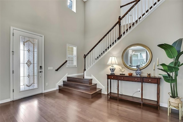 1821 Cherry Walk Rd, Lutz, FL 33558 - entrance foyer with wood finished floors, stairs, baseboards, and a high ceiling