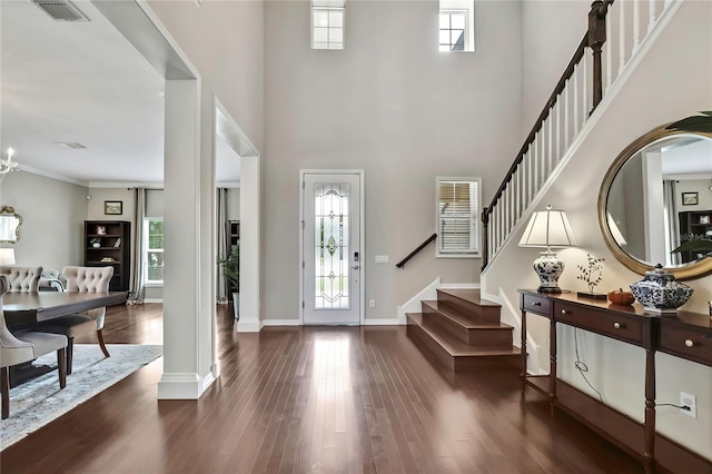 1821 Cherry Walk Rd, Lutz, FL 33558 - entryway with stairway, wood finished floors, a high ceiling, and baseboards