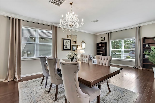 1821 Cherry Walk Rd, Lutz, FL 33558 - dining space featuring crown molding, a chandelier, baseboards, and wood finished floors
