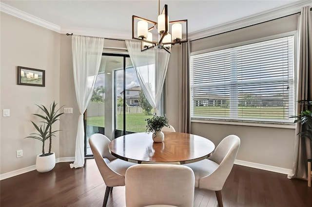 1821 Cherry Walk Rd, Lutz, FL 33558 - dining space featuring baseboards, a chandelier, dark wood-type flooring, and crown molding