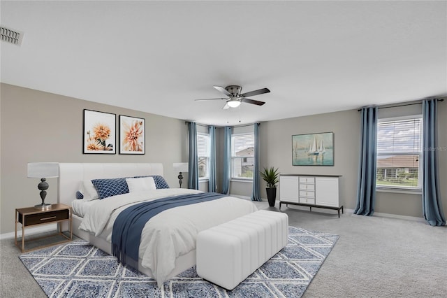 1821 Cherry Walk Rd, Lutz, FL 33558 - carpeted bedroom with baseboards and ceiling fan